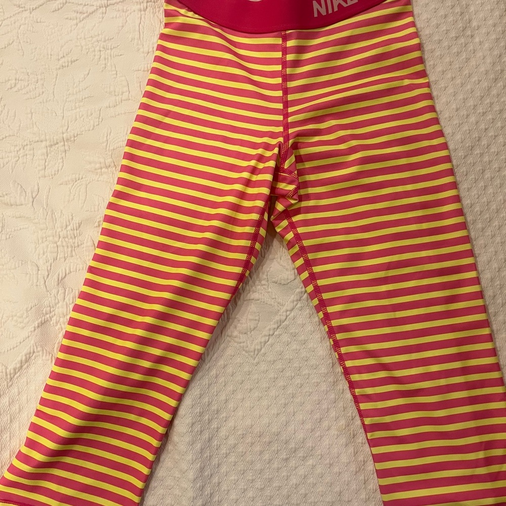 Nike Pink and yellow Striped Leggings